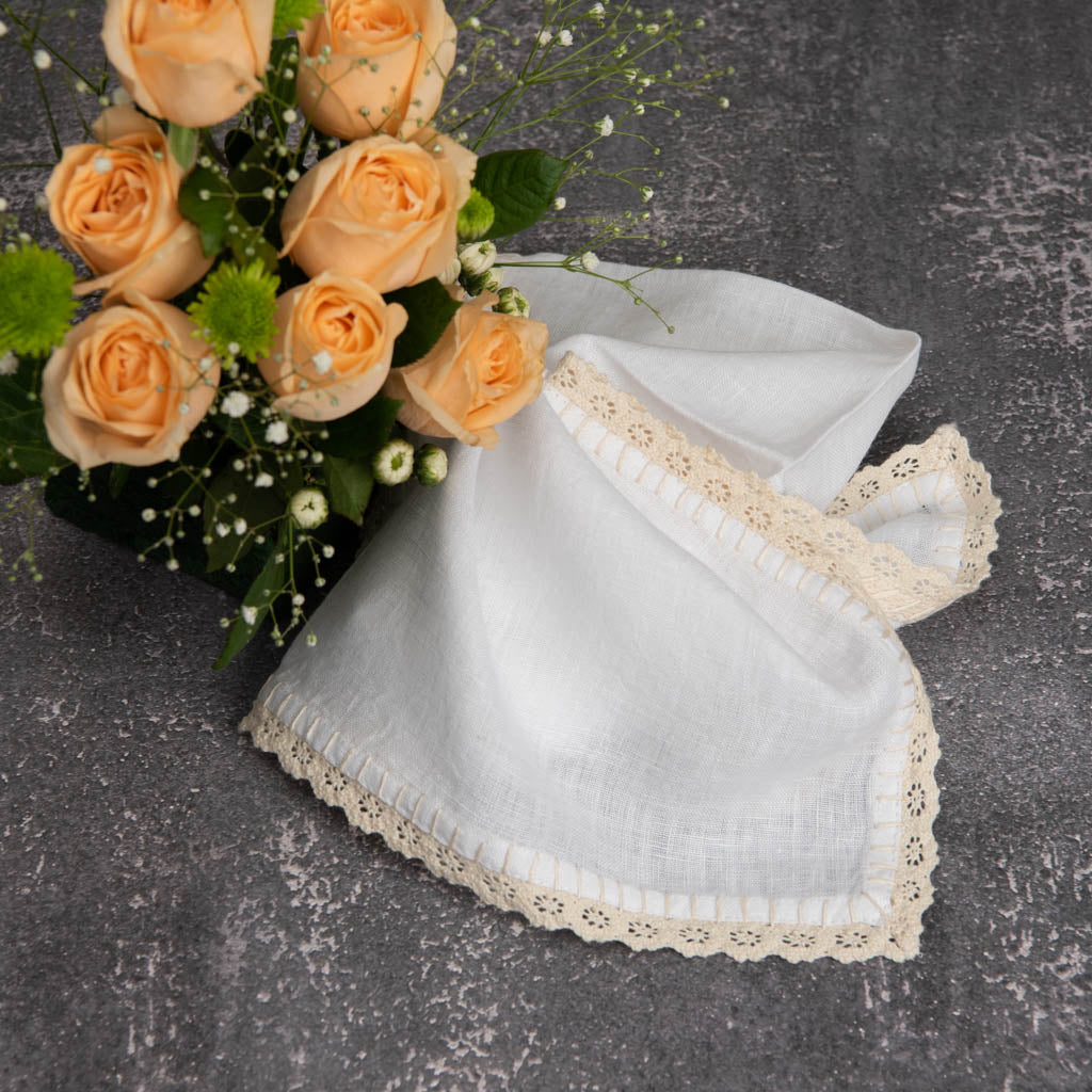 Crochet edged white linen dinner napkins