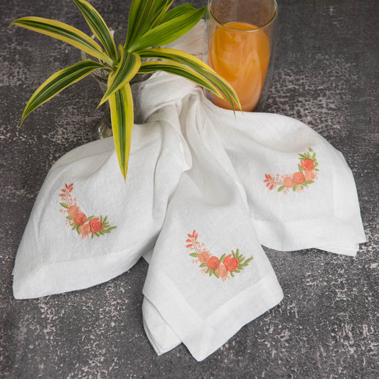Embroidered white linen napkins