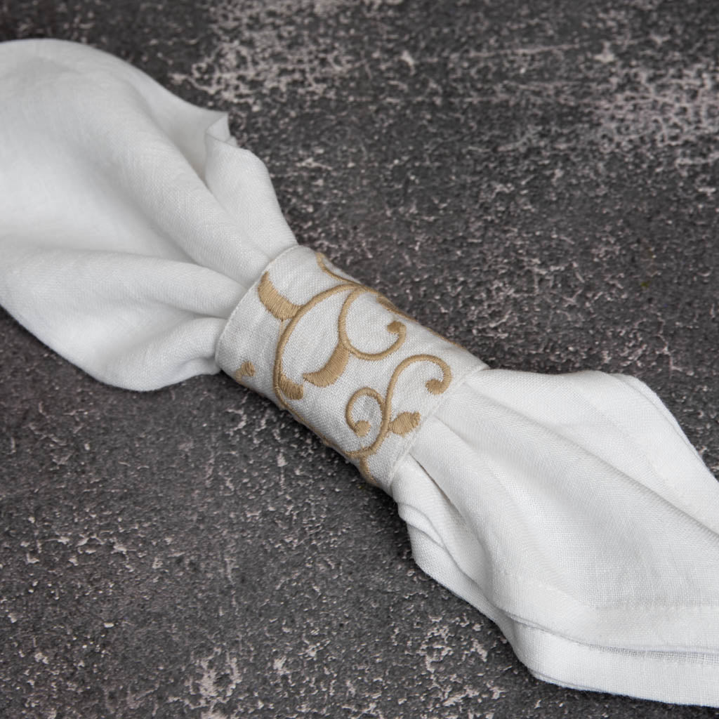 Embroidered white linen napkin rings