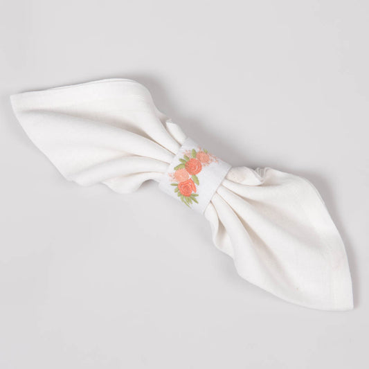 Embroidered white linen napkin rings