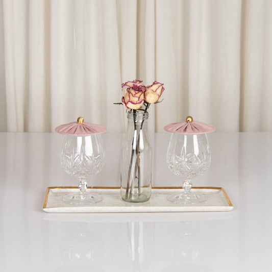 Glass covers in dusty rose linen with gold bead handle