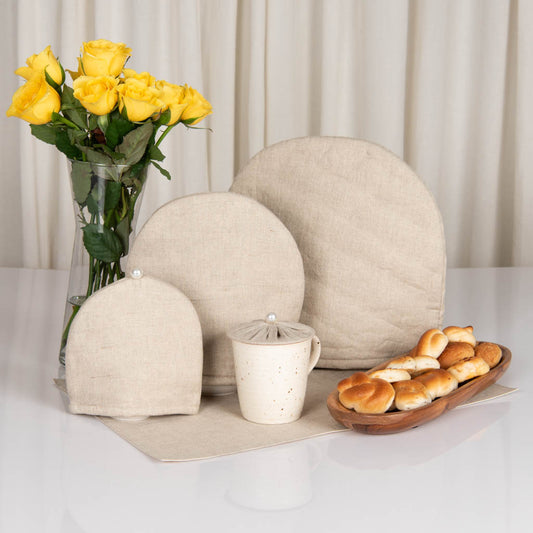 Natural linen tray mat, tea cosy, milk cosy and glass cover