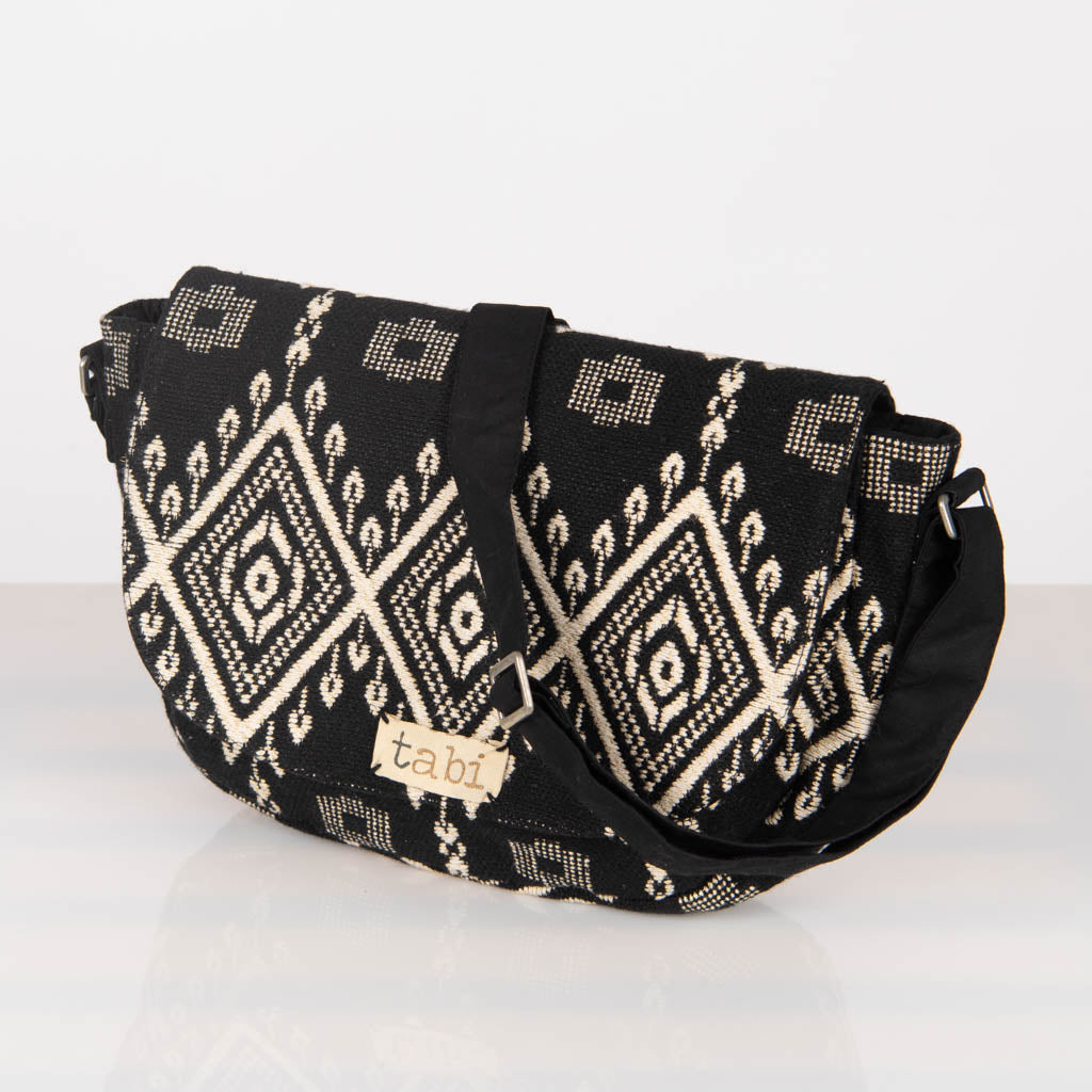 Jacquard cross body conductor bag