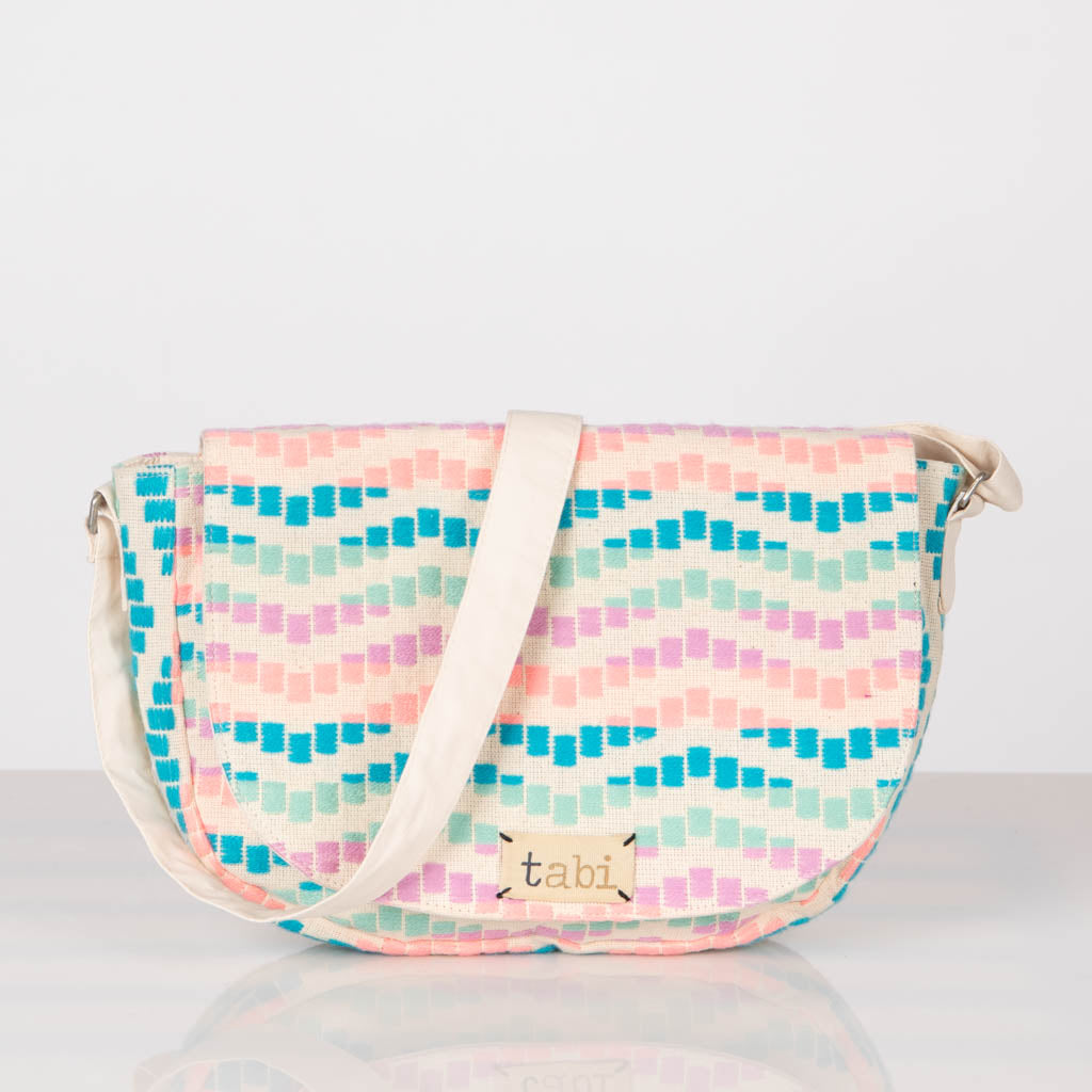 Jacquard cross body conductor bag