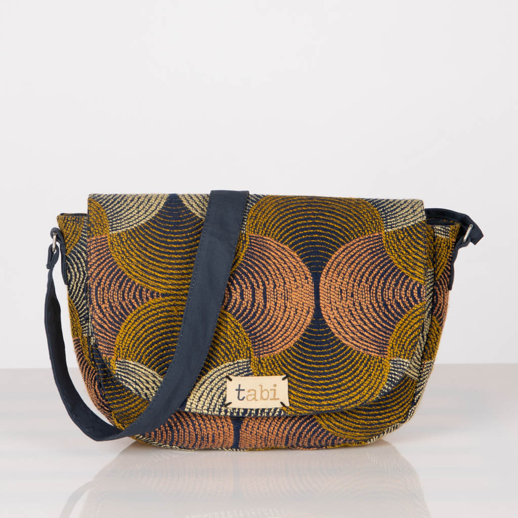 Jacquard cross body conductor bag