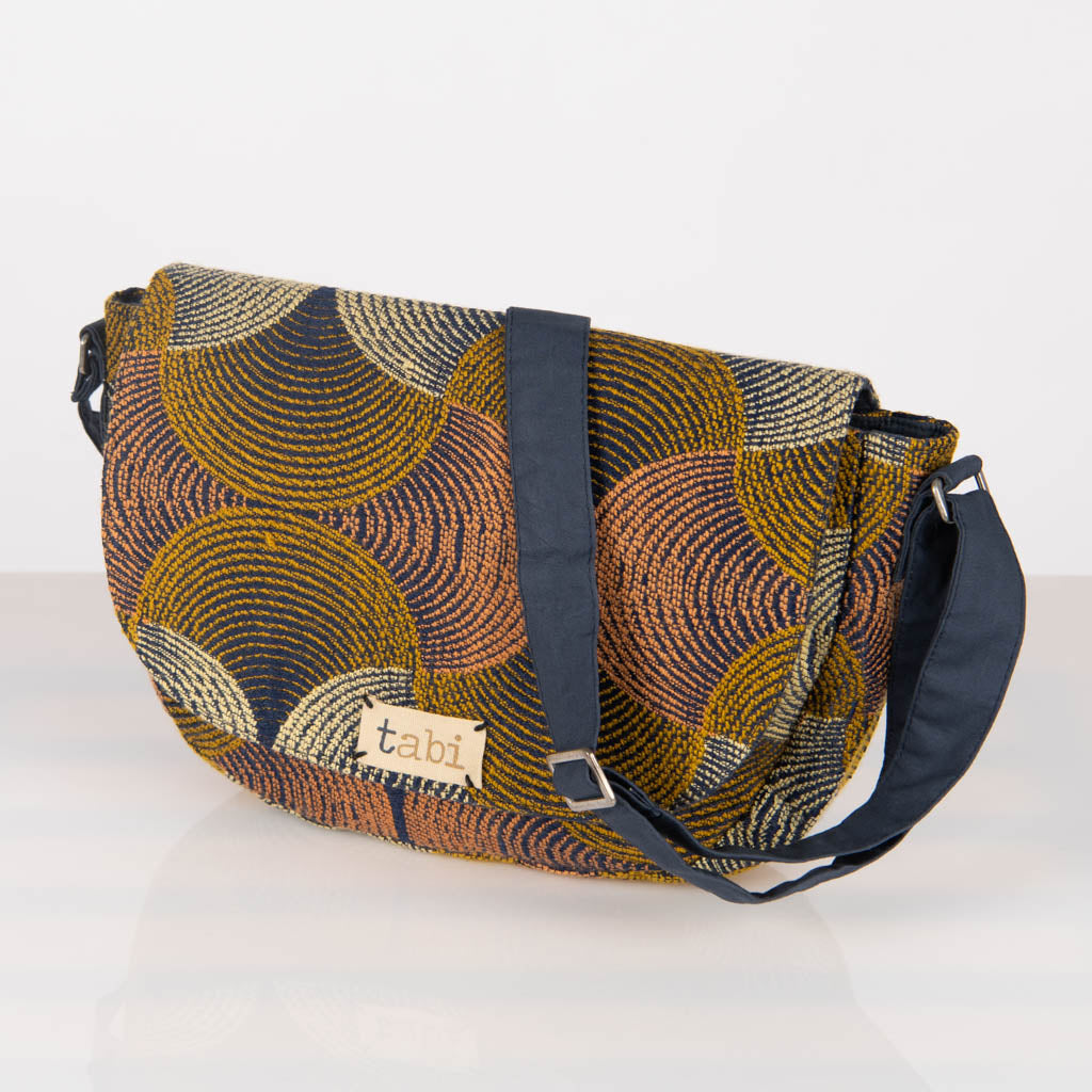 Jacquard cross body conductor bag