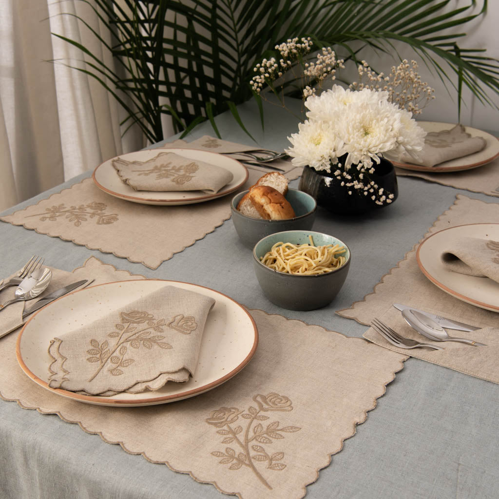 Cutwork edged embroidered natural table linen set