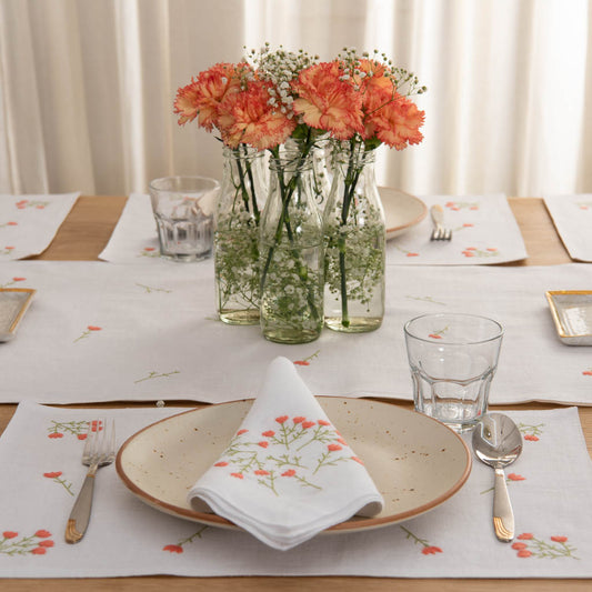 Embroidered white table linen set