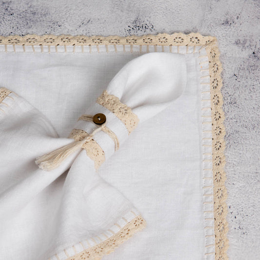 Lace edged white linen napkin rings